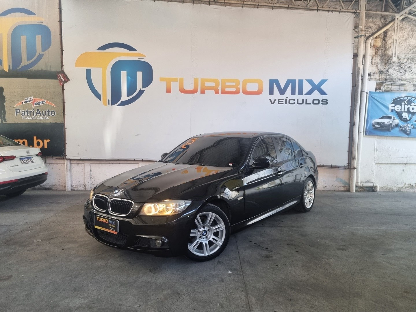 //www.autoline.com.br/carro/bmw/318i-20-16v-gasolina-4p-automatico/2012/rio-de-janeiro-rj/23955740