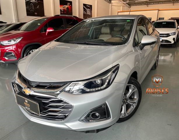 //www.autoline.com.br/carro/chevrolet/cruze-14-sedan-premier-16v-flex-4p-turbo-automatico/2022/patrocinio-mg/24136919
