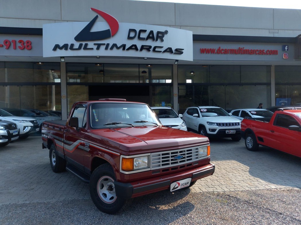//www.autoline.com.br/carro/chevrolet/d-20-pick-up-40-custom-de-luxe-cabsimp-90cv-2p-diesel-manu/1990/braganca-paulista-sp/16389579