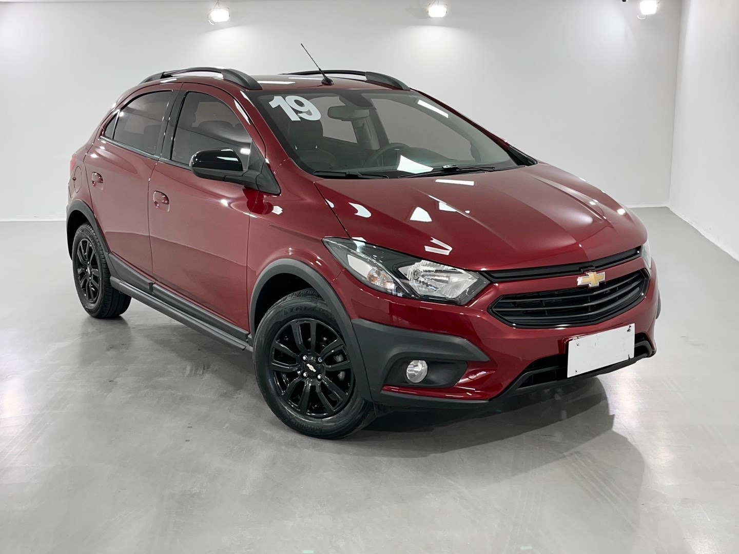 //www.autoline.com.br/carro/chevrolet/onix-14-activ-8v-flex-4p-automatico/2019/belo-horizonte-mg/23783603