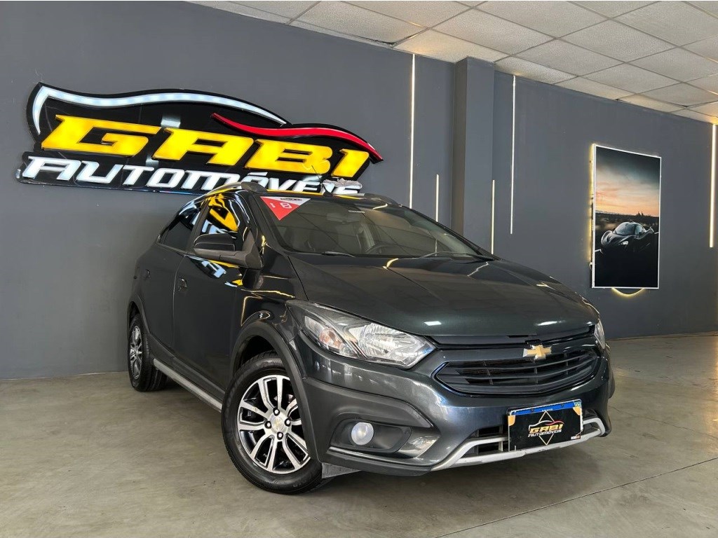 //www.autoline.com.br/carro/chevrolet/onix-14-activ-8v-flex-4p-automatico/2018/sao-joao-de-meriti-rj/24477649