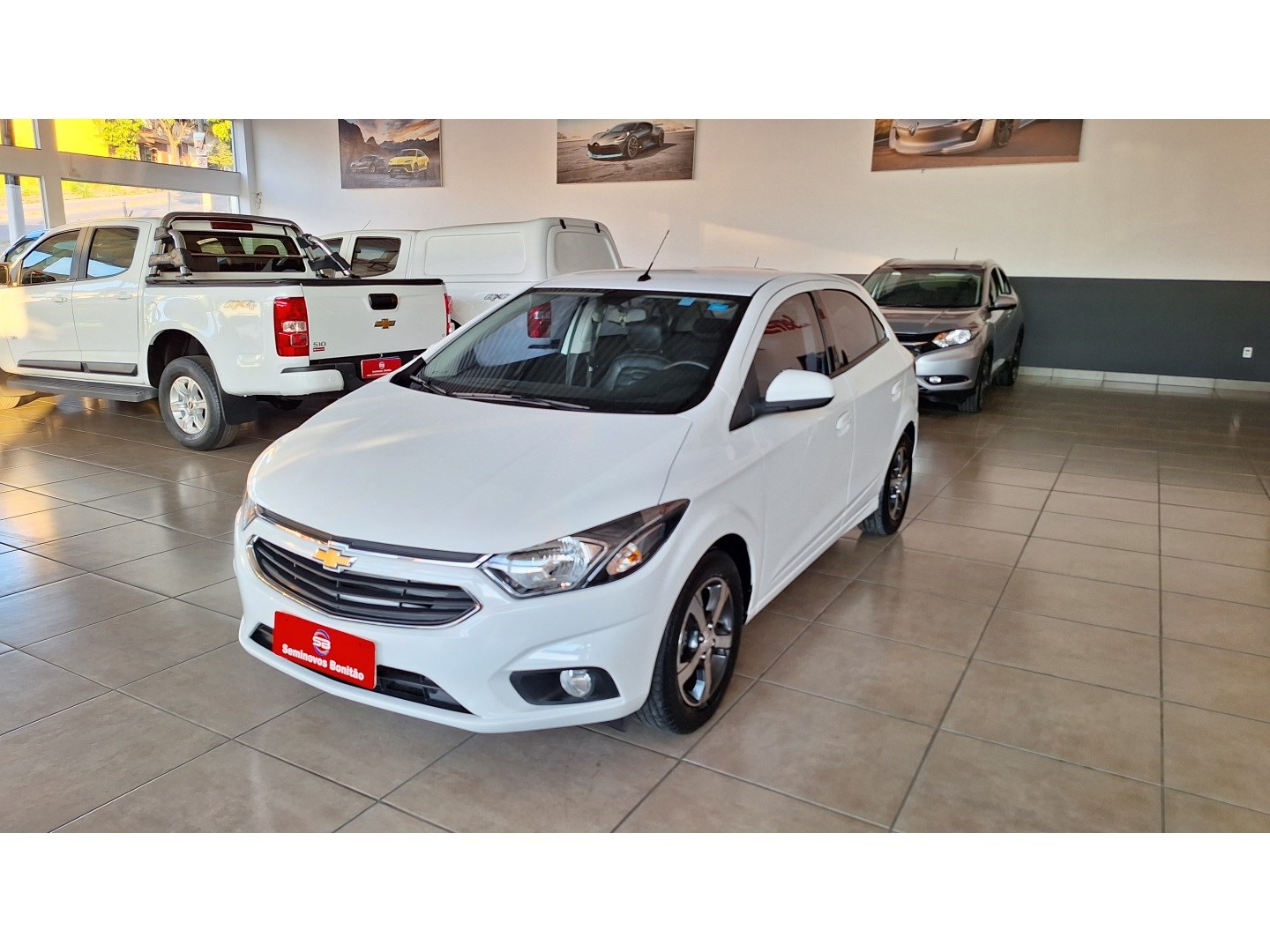 //www.autoline.com.br/carro/chevrolet/onix-14-ltz-8v-flex-4p-automatico/2019/divinopolis-mg/24500136