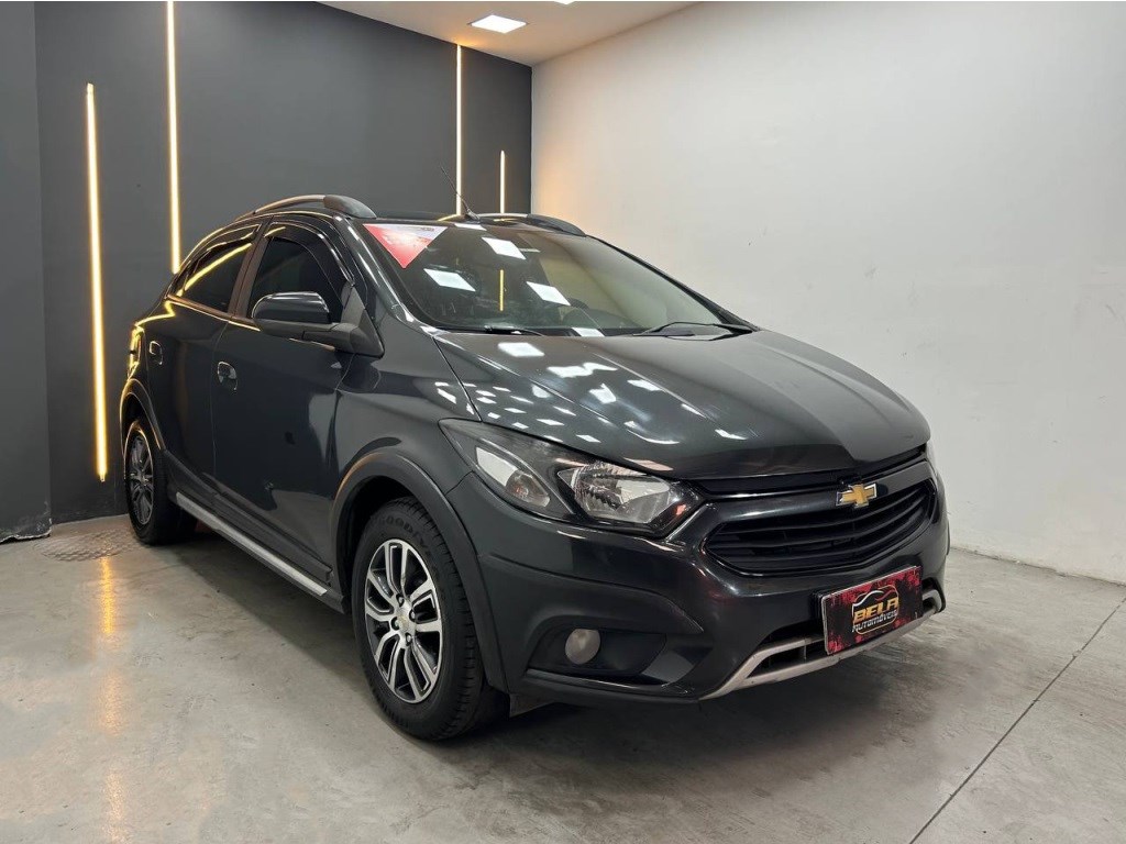 //www.autoline.com.br/carro/chevrolet/onix-14-activ-8v-flex-4p-automatico/2018/sao-joao-de-meriti-rj/24688554
