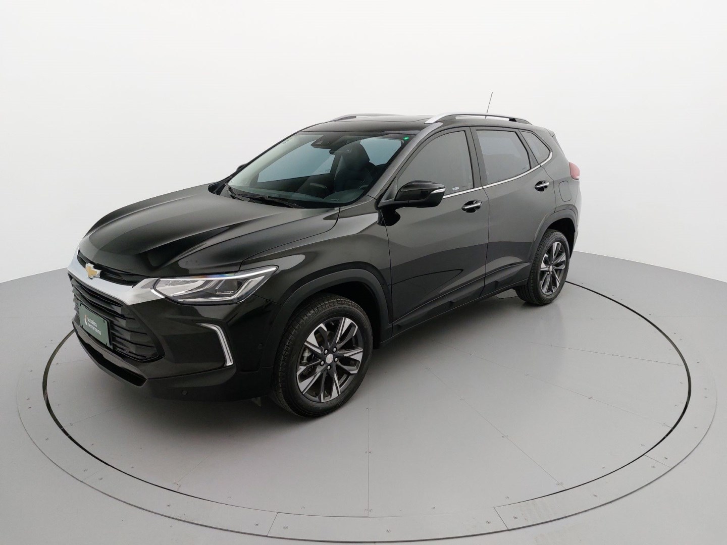 //www.autoline.com.br/carro/chevrolet/tracker-12-turbo-premier-12v-flex-4p-automatico/2024/mogi-das-cruzes-sp/24945100