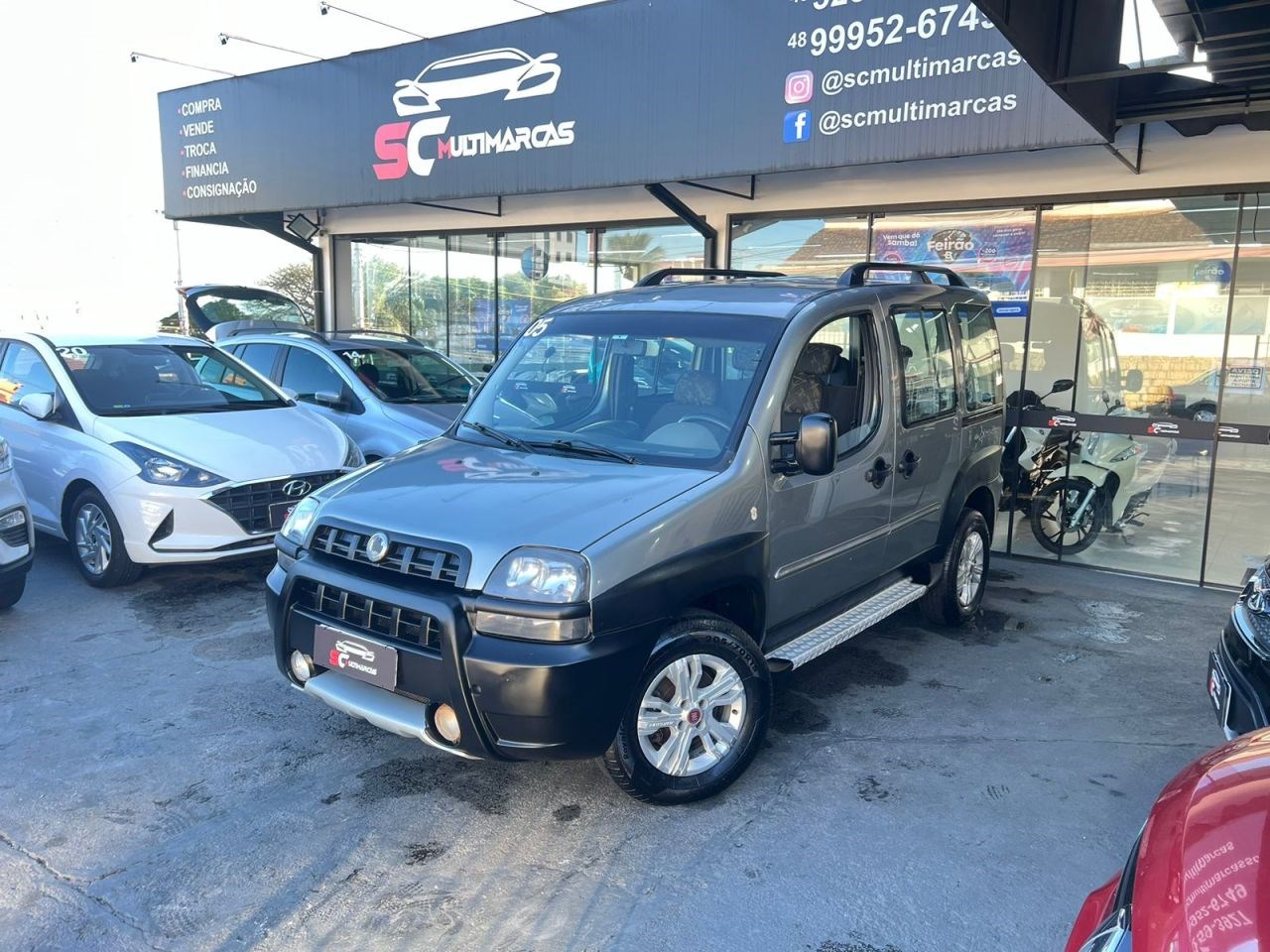 //www.autoline.com.br/carro/fiat/doblo-18-adventure-estrada-real-8v-gasolina-4p-manu/2005/florianopolis-sc/25006669