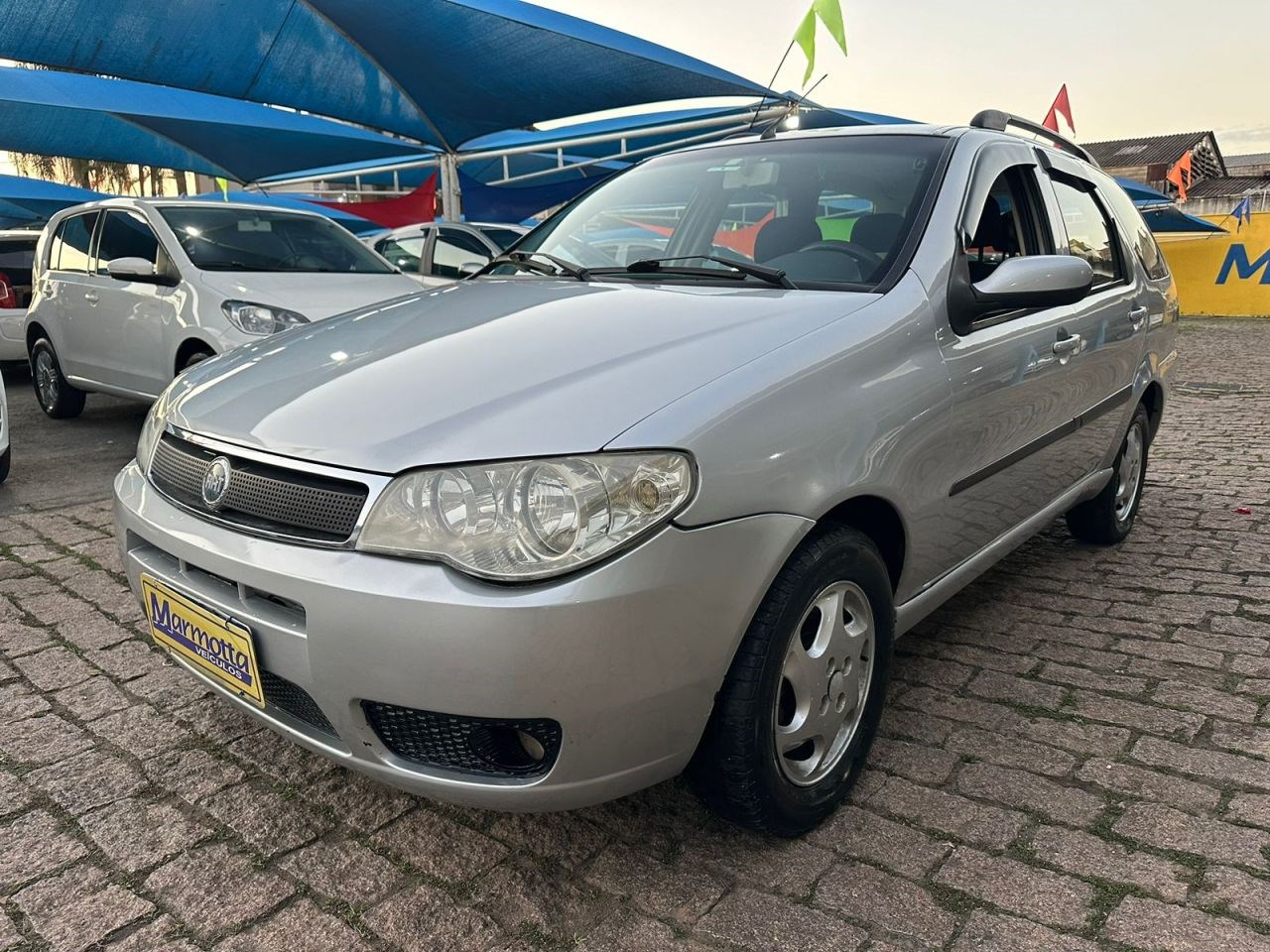 //www.autoline.com.br/carro/fiat/palio-weekend-18-hlx-8v-flex-4p-manual/2006/amparo-sp/24970971