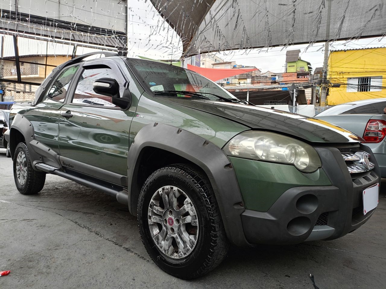 //www.autoline.com.br/carro/fiat/strada-18-cd-adventure-locker-16v-flex-2p-manual/2011/barueri-sp/24385033