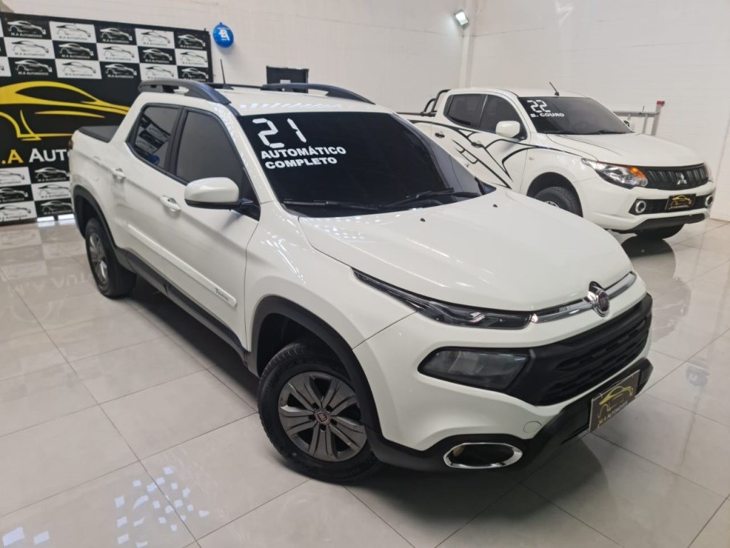 //www.autoline.com.br/carro/fiat/toro-18-freedom-16v-flex-4p-automatico/2021/rio-de-janeiro-rj/24378697