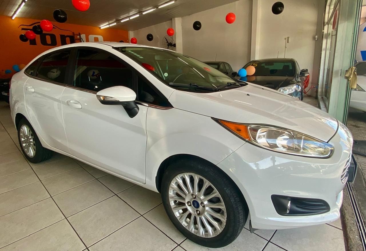 //www.autoline.com.br/carro/ford/fiesta-16-sedan-tivct-se-16v-flex-4p-powershift/2015/florianopolis-sc/24227231