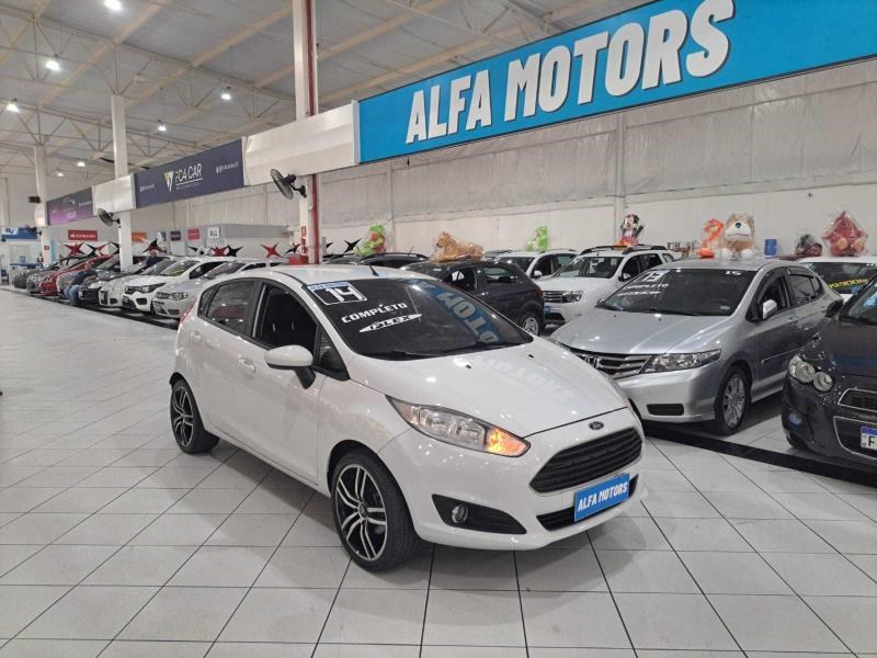 //www.autoline.com.br/carro/ford/fiesta-15-hatch-n-vct-se-16v-flex-4p-manual/2014/sao-paulo-sp/24386938