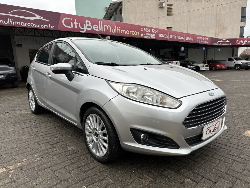 //www.autoline.com.br/carro/ford/fiesta-16-hatch-tivct-titanium-16v-flex-4p-powershif/2014/francisco-beltrao-pr/24665135