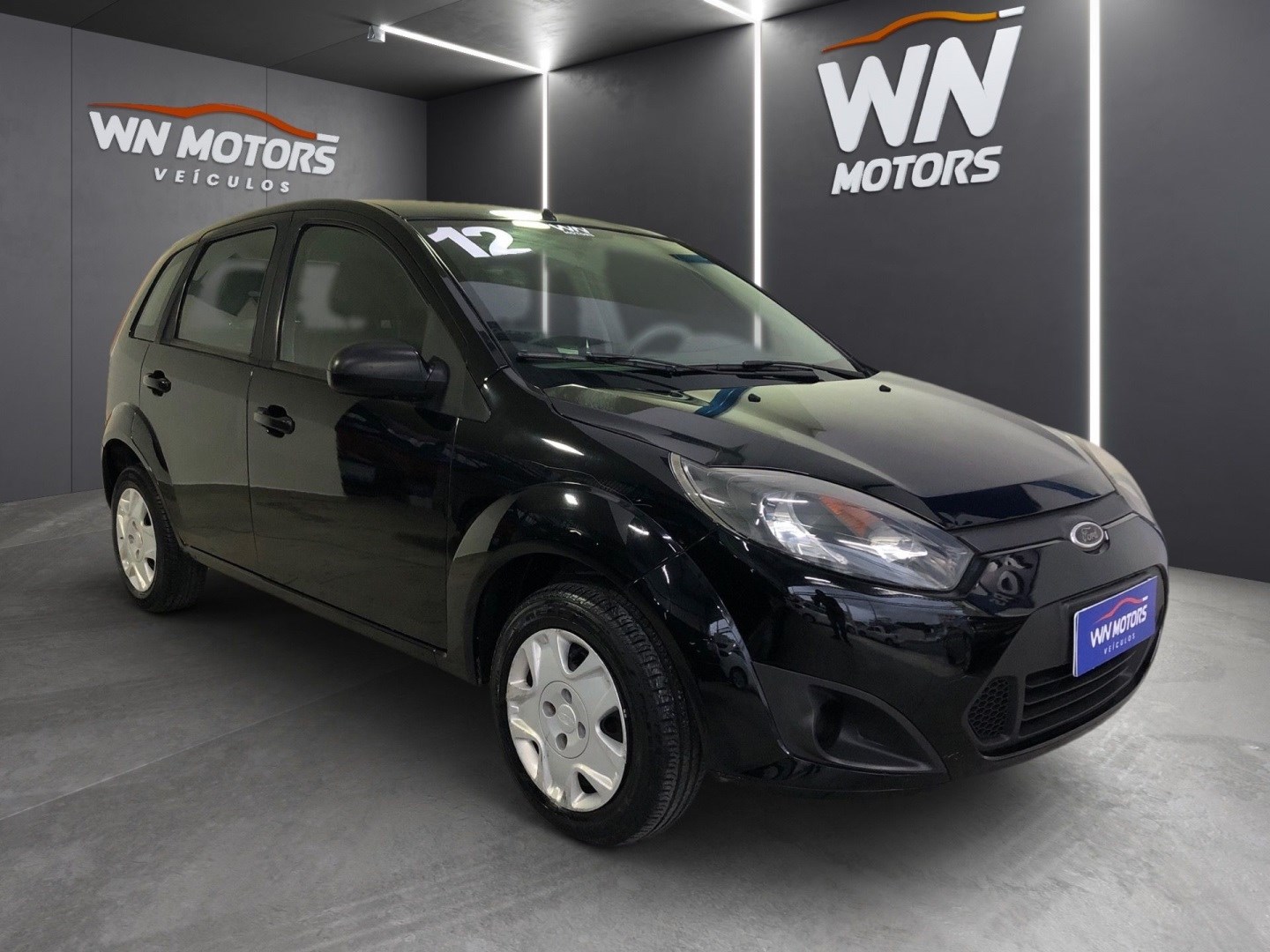 //www.autoline.com.br/carro/ford/fiesta-10-hatch-rocam-8v-flex-4p-manual/2012/campos-dos-goytacazes-rj/24908859