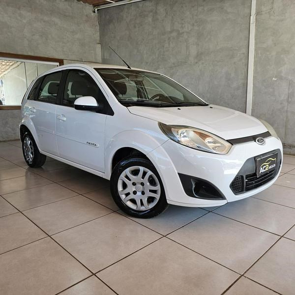 //www.autoline.com.br/carro/ford/fiesta-16-hatch-rocam-se-8v-flex-4p-manual/2014/brasilia-df/24942102