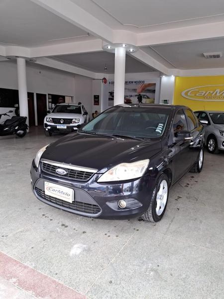 //www.autoline.com.br/carro/ford/focus-20-sedan-ghia-16v-gasolina-4p-manual/2009/brasilia-df/24401561