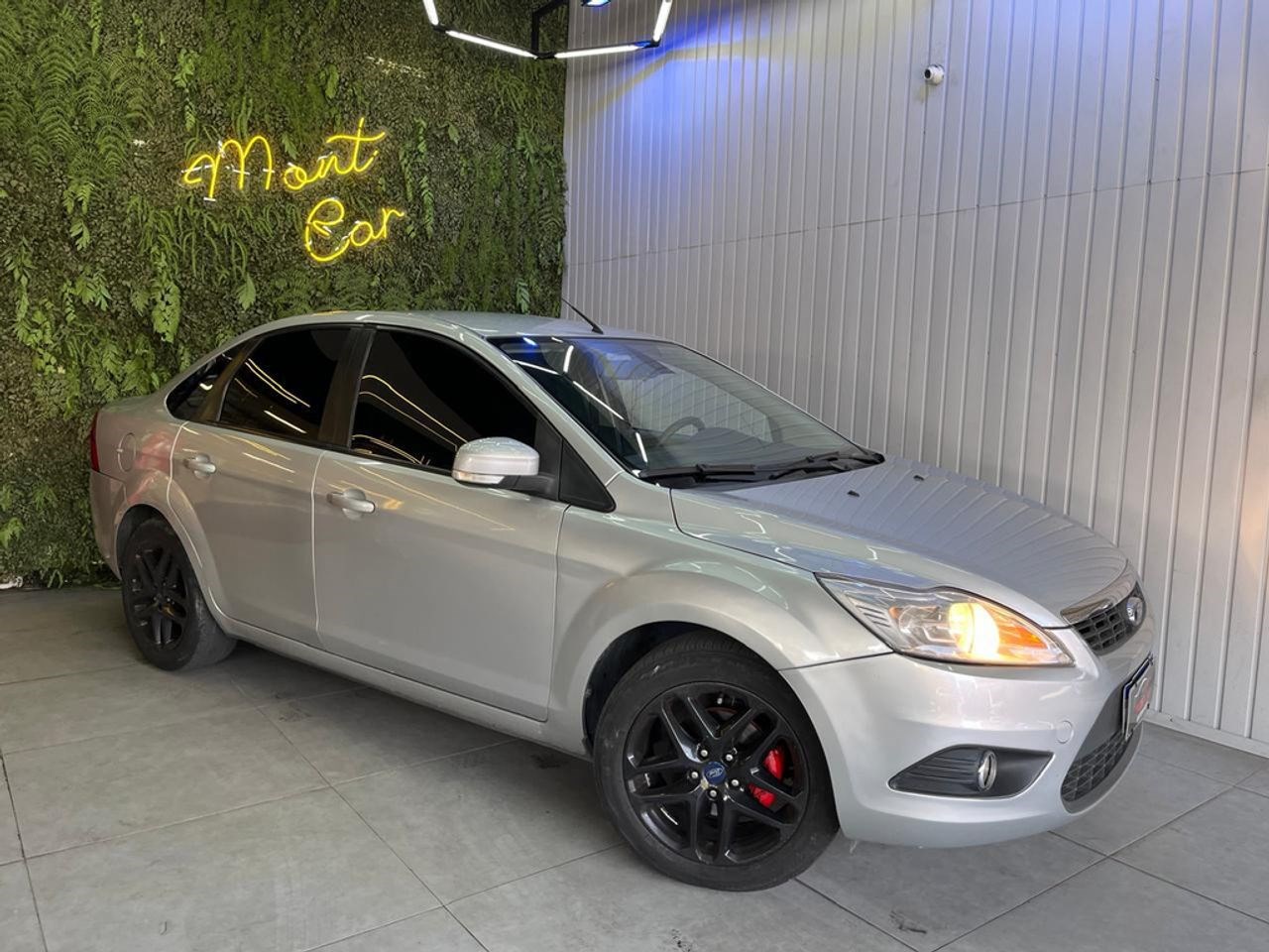 //www.autoline.com.br/carro/ford/focus-20-sedan-glx-16v-flex-4p-automatico/2013/osasco-sp/25018408