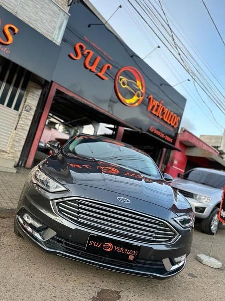 //www.autoline.com.br/carro/ford/fusion-20-ecoboost-titanium-awd-16v-gasolina-4p-turb/2017/rio-branco-do-sul-pr/24524395