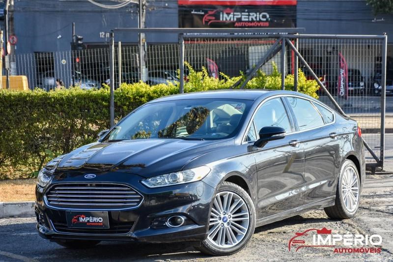 //www.autoline.com.br/carro/ford/fusion-20-gtdi-titanium-fwd-plus-16v-gasolina-4p-tur/2013/belo-horizonte-mg/24771452