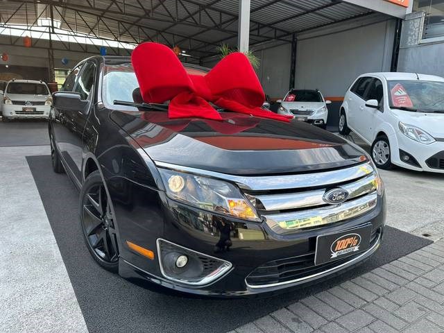 //www.autoline.com.br/carro/ford/fusion-25-sel-16v-gasolina-4p-automatico/2011/joinville-sc/24803170