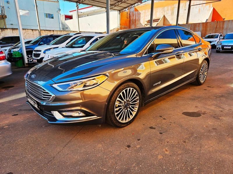 //www.autoline.com.br/carro/ford/fusion-20-hybrid-titanium-16v-gasolina-4p-automatico/2018/araucaria-pr/25007797