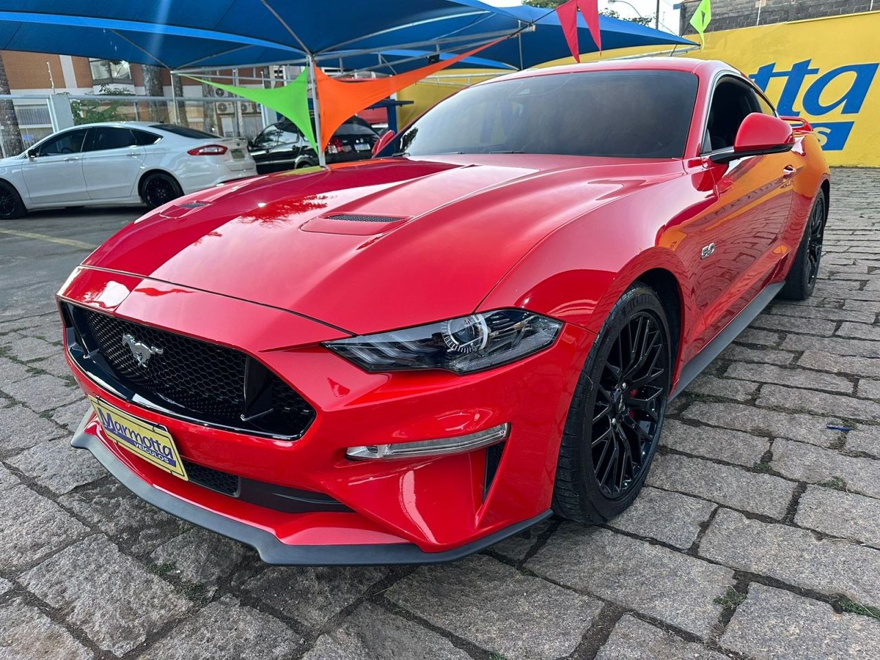 //www.autoline.com.br/carro/ford/mustang-50-coupe-gt-premium-32v-gasolina-2p-automatic/2019/amparo-sp/24303901