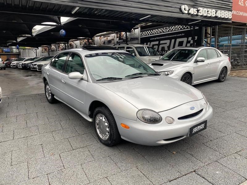 //www.autoline.com.br/carro/ford/taurus-30-lx-24v-gasolina-4p-automatico/1997/cascavel-pr/24235125