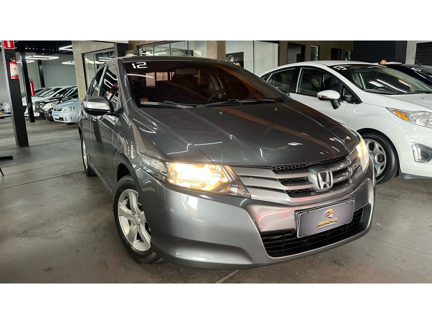 //www.autoline.com.br/carro/honda/city-15-dx-16v-flex-4p-automatico/2012/santa-barbara-doeste-sp/24050416