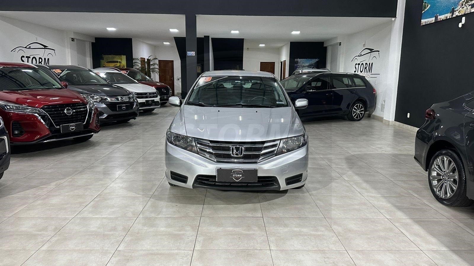 //www.autoline.com.br/carro/honda/city-15-lx-16v-flex-4p-automatico/2013/campos-dos-goytacazes-rj/24609064