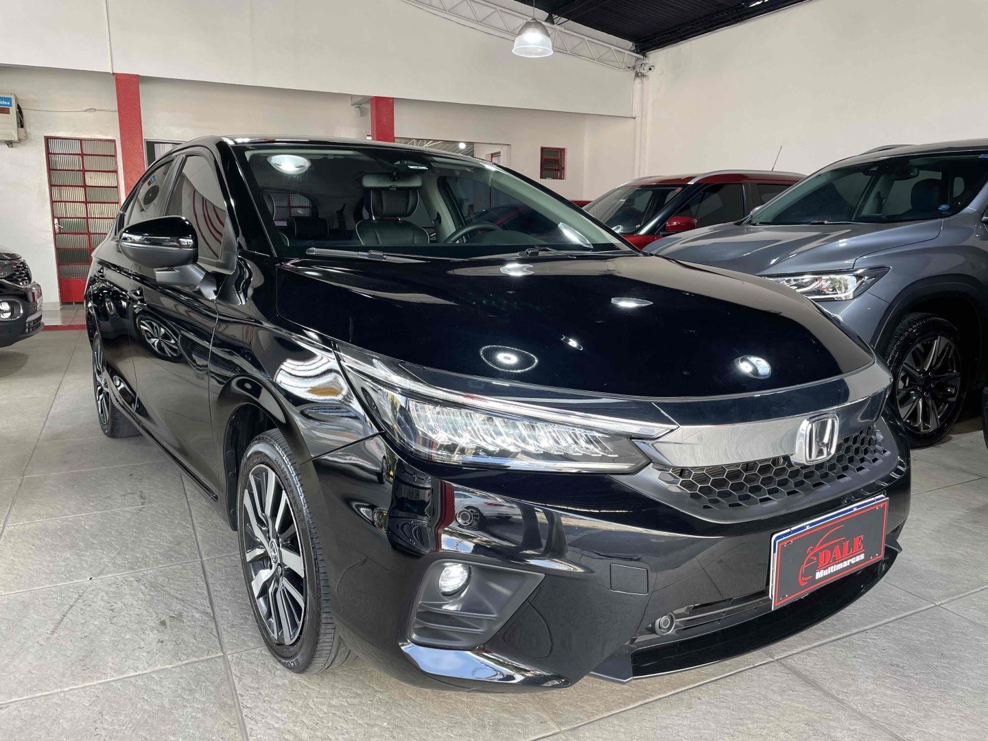 //www.autoline.com.br/carro/honda/city-15-sedan-touring-16v-flex-4p-cvt/2022/belo-horizonte-mg/24936682