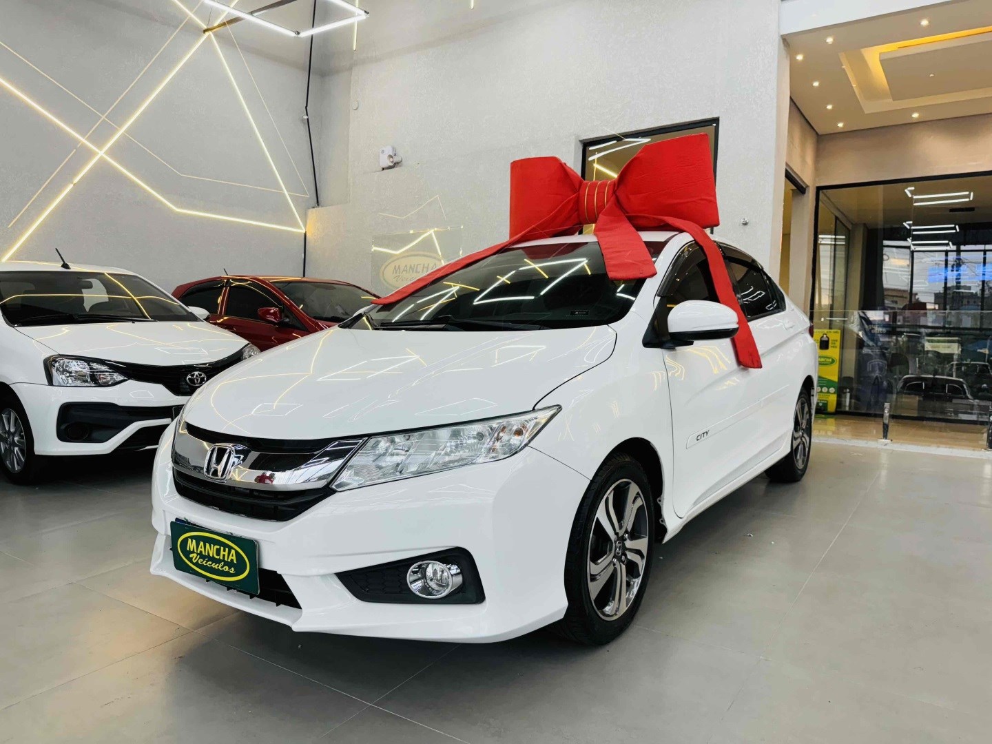 //www.autoline.com.br/carro/honda/city-15-lx-16v-flex-4p-cvt/2015/jandira-sp/25026674