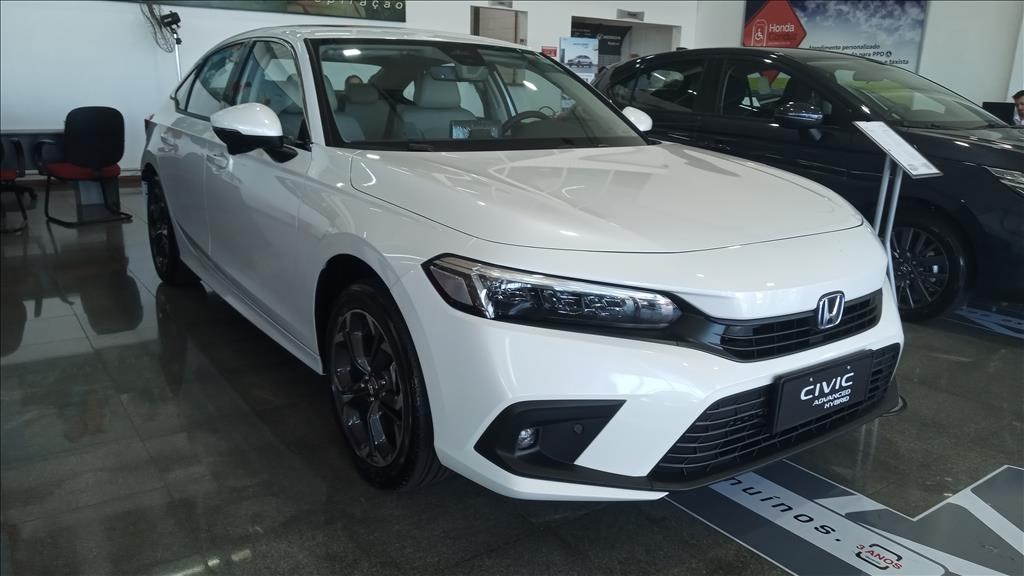 //www.autoline.com.br/carro/honda/civic-20-hibrido-touring-16v-gasolina-4p-e-cvt/2024/mogi-mirim-sp/23302602