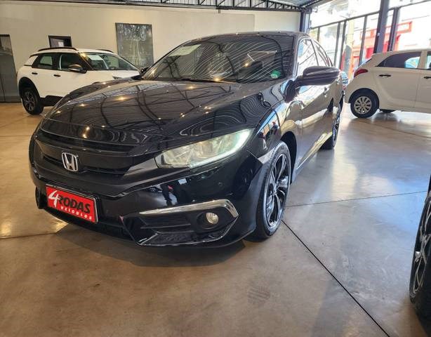 //www.autoline.com.br/carro/honda/civic-20-sport-16v-flex-4p-cvt/2017/pocos-de-caldas-mg/24606063