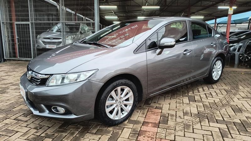 //www.autoline.com.br/carro/honda/civic-20-lxr-16v-flex-4p-automatico/2014/cascavel-pr/24876805