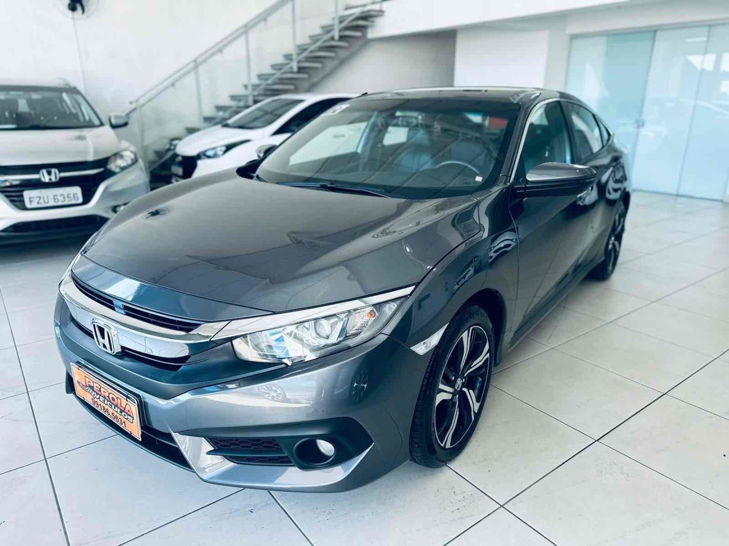 //www.autoline.com.br/carro/honda/civic-20-exl-16v-flex-4p-cvt/2017/santa-barbara-doeste-sp/24963383