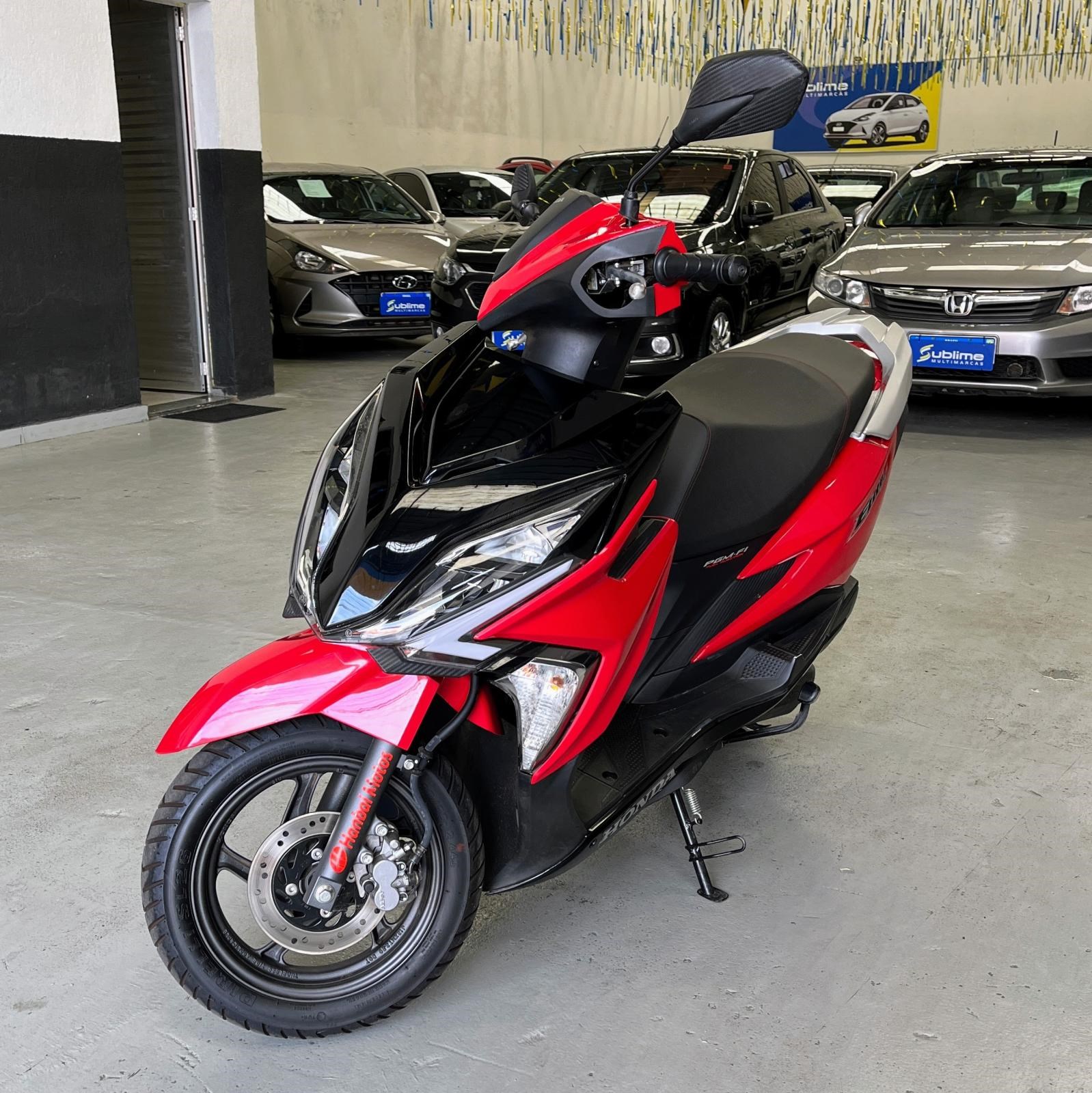 //www.autoline.com.br/moto/honda/elite-125-gas-aut/2022/contagem-mg/23869769