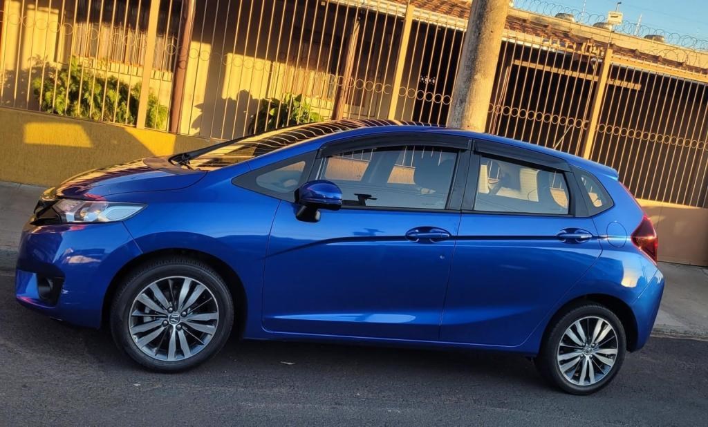 //www.autoline.com.br/carro/honda/fit-15-ex-16v-flex-4p-automatico/2014/uberaba-mg/24149949