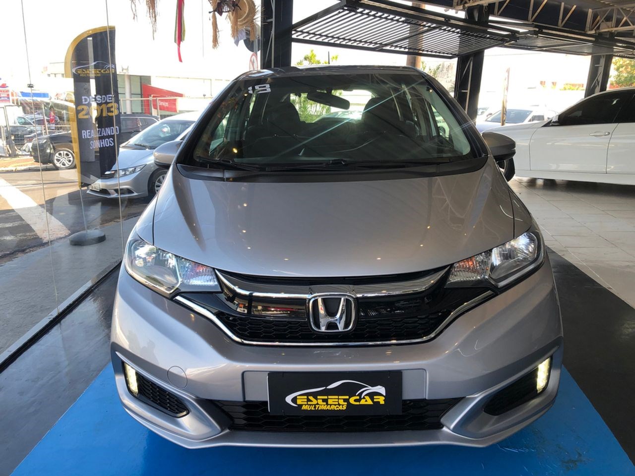 //www.autoline.com.br/carro/honda/fit-15-personal-16v-flex-4p-cvt/2019/americana-sp/24710279