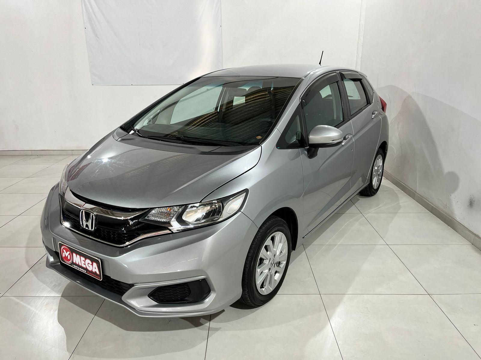 //www.autoline.com.br/carro/honda/fit-15-personal-16v-flex-4p-cvt/2018/guaramirim-sc/24830903