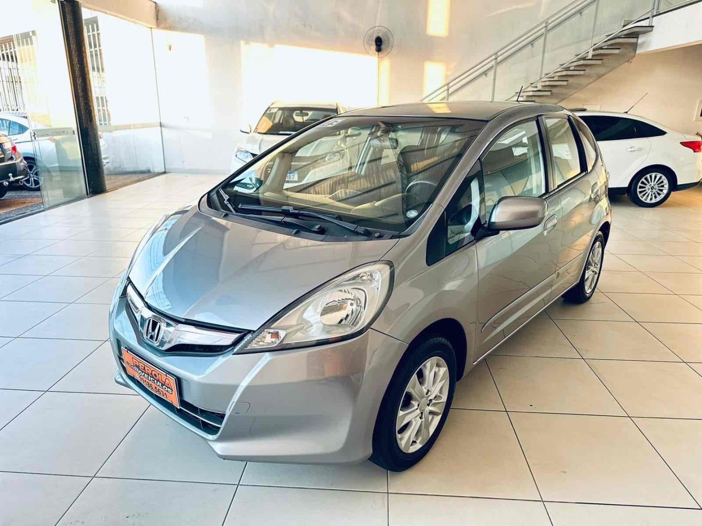 //www.autoline.com.br/carro/honda/fit-14-lx-16v-flex-4p-automatico/2013/santa-barbara-doeste-sp/24844467
