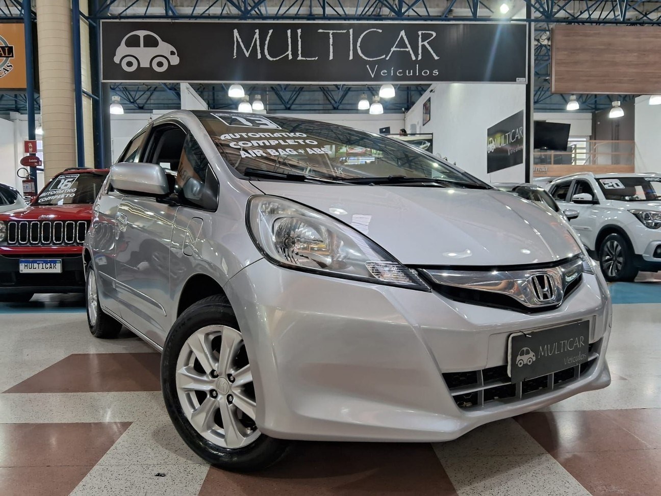 //www.autoline.com.br/carro/honda/fit-14-lx-16v-flex-4p-automatico/2013/santo-andre-sp/24893371