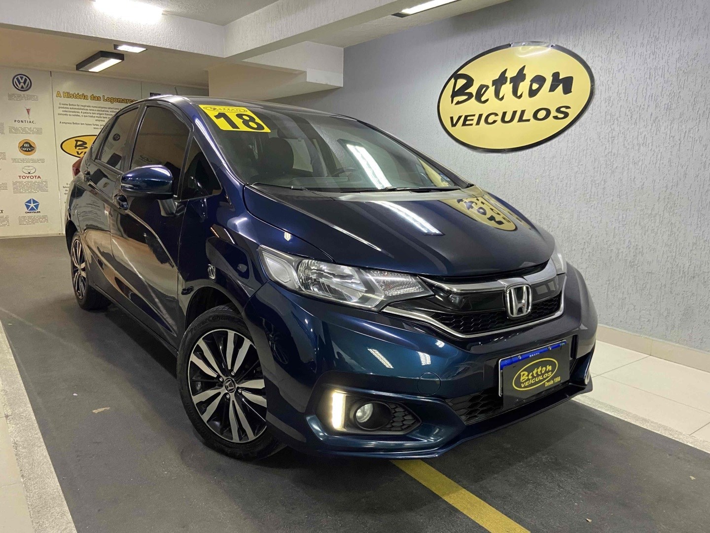 //www.autoline.com.br/carro/honda/fit-15-ex-16v-flex-4p-cvt/2018/niteroi-rj/24940586