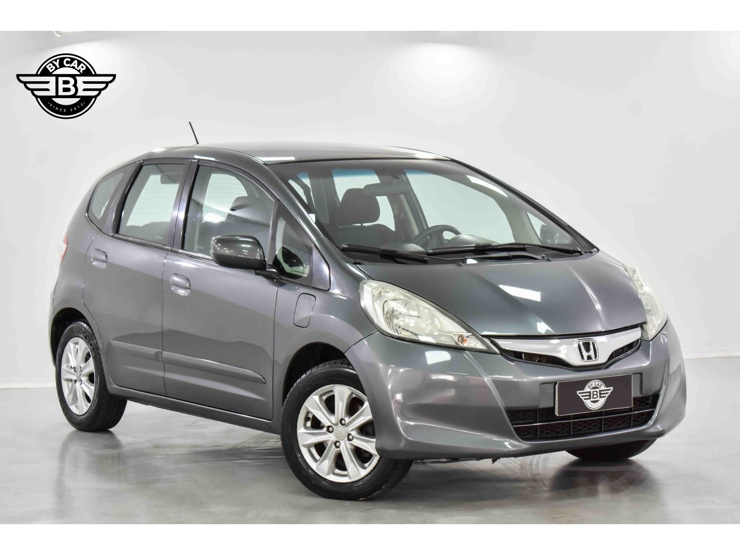 //www.autoline.com.br/carro/honda/fit-14-lx-16v-flex-4p-automatico/2013/belo-horizonte-mg/24972267