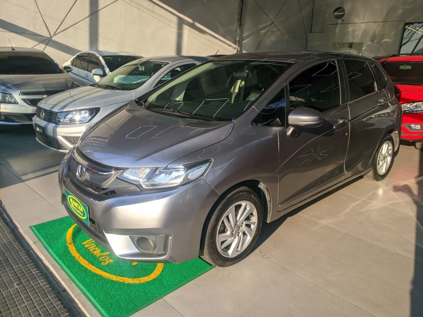//www.autoline.com.br/carro/honda/fit-15-lx-16v-flex-4p-cvt/2015/jandira-sp/25026708