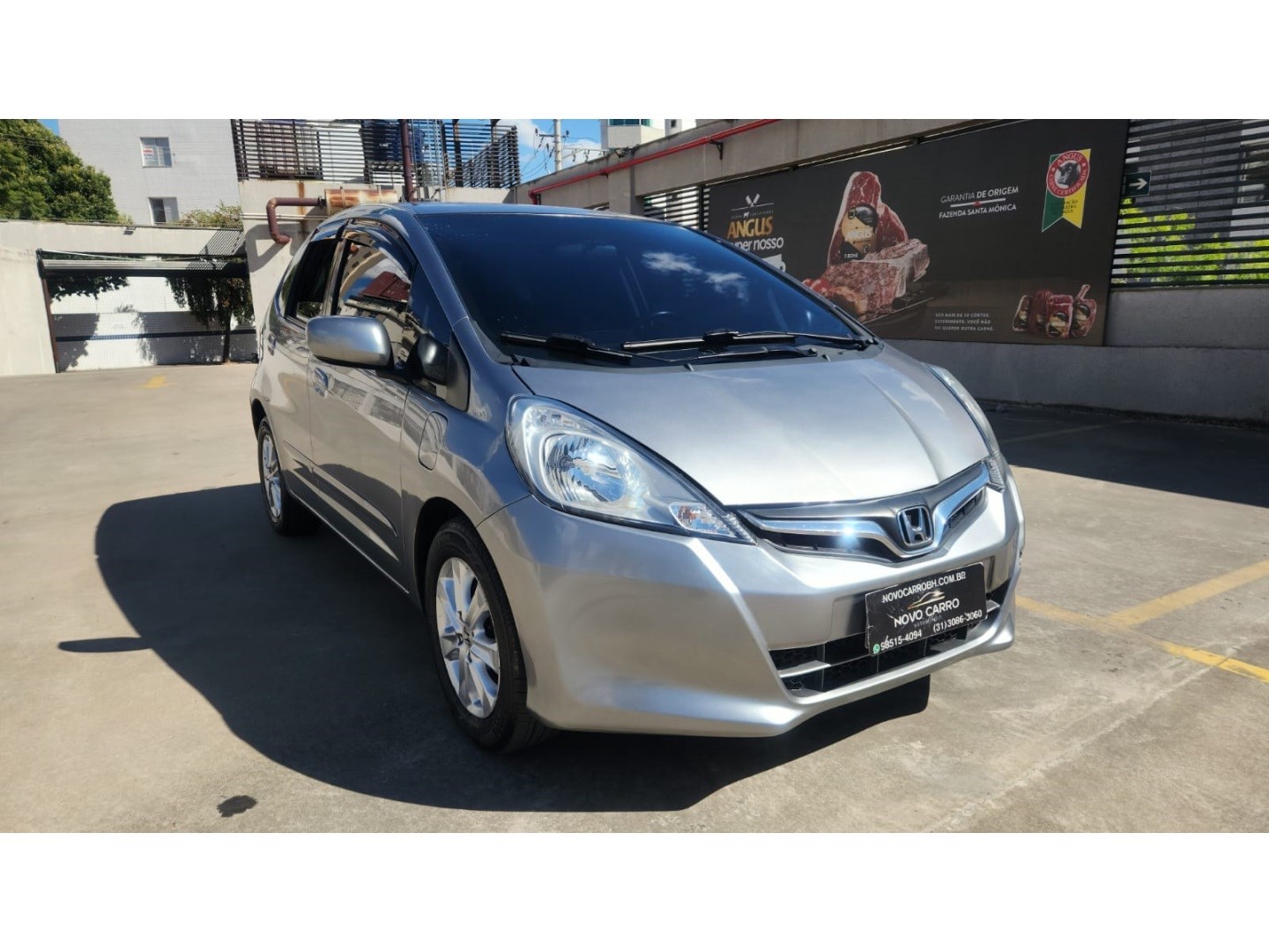 //www.autoline.com.br/carro/honda/fit-14-lx-16v-flex-4p-automatico/2013/belo-horizonte-mg/25029467