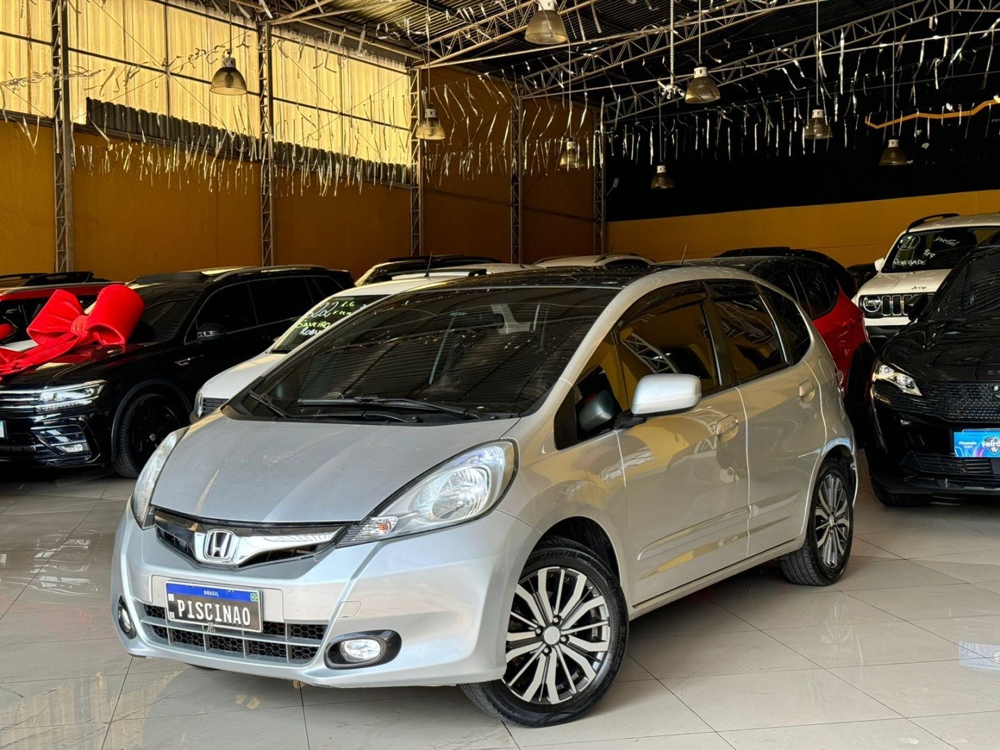 //www.autoline.com.br/carro/honda/fit-14-lx-16v-flex-4p-automatico/2013/embu-das-artes-sp/25029542