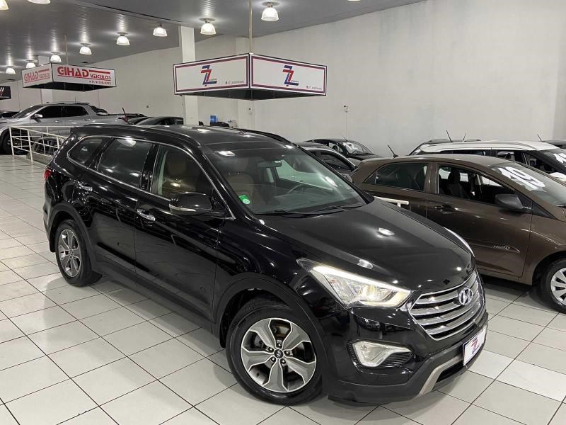 //www.autoline.com.br/carro/hyundai/grand-santa-fe-33-v6-gls-24v-gasolina-4p-4x4-automatico/2014/sao-paulo-sp/24965464