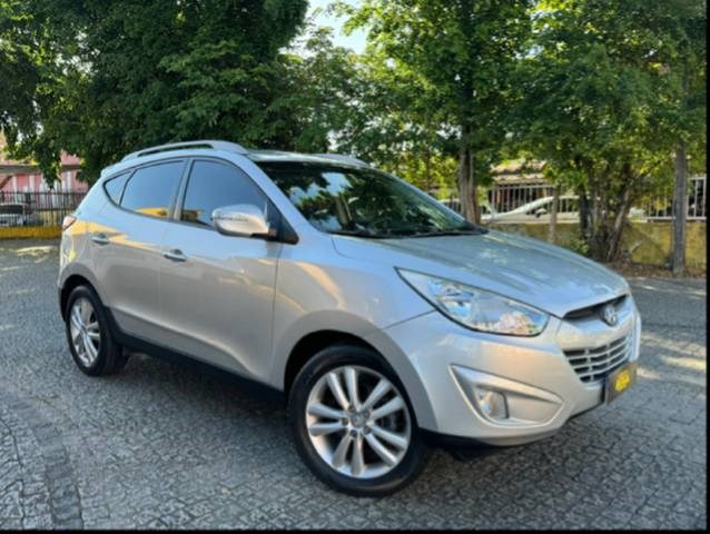 //www.autoline.com.br/carro/hyundai/ix35-20-16v-flex-4p-automatico/2014/joinville-sc/23670028