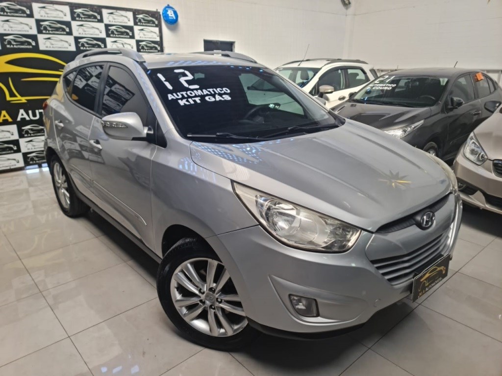 //www.autoline.com.br/carro/hyundai/ix35-20-16v-flex-4p-automatico/2012/rio-de-janeiro-rj/23899197