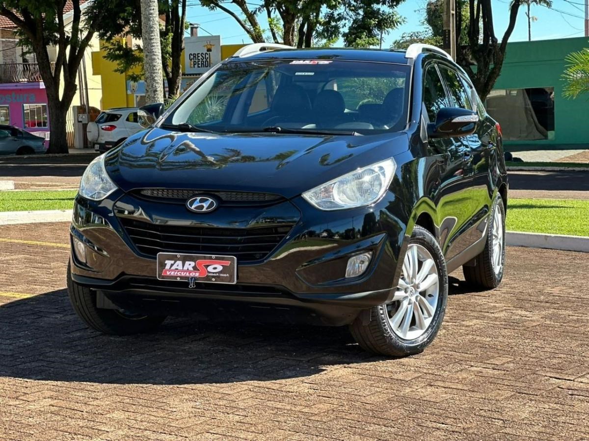 //www.autoline.com.br/carro/hyundai/ix35-20-16v-flex-4p-automatico/2013/cafelandia-pr/24973652