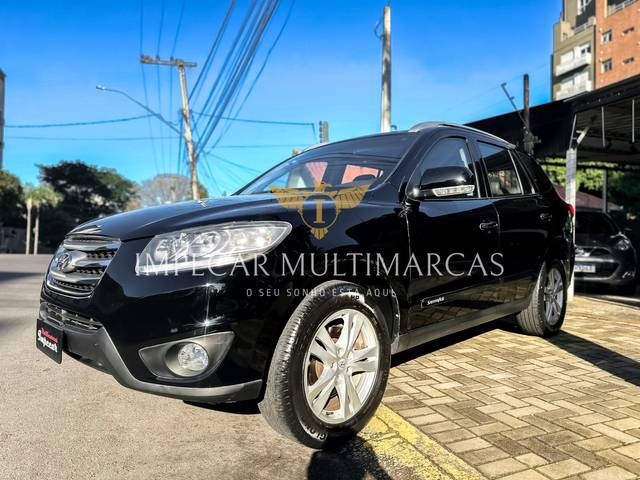 //www.autoline.com.br/carro/hyundai/santa-fe-35-v6-7l-24v-gasolina-4p-4x4-automatico/2011/novo-hamburgo-rs/24682844