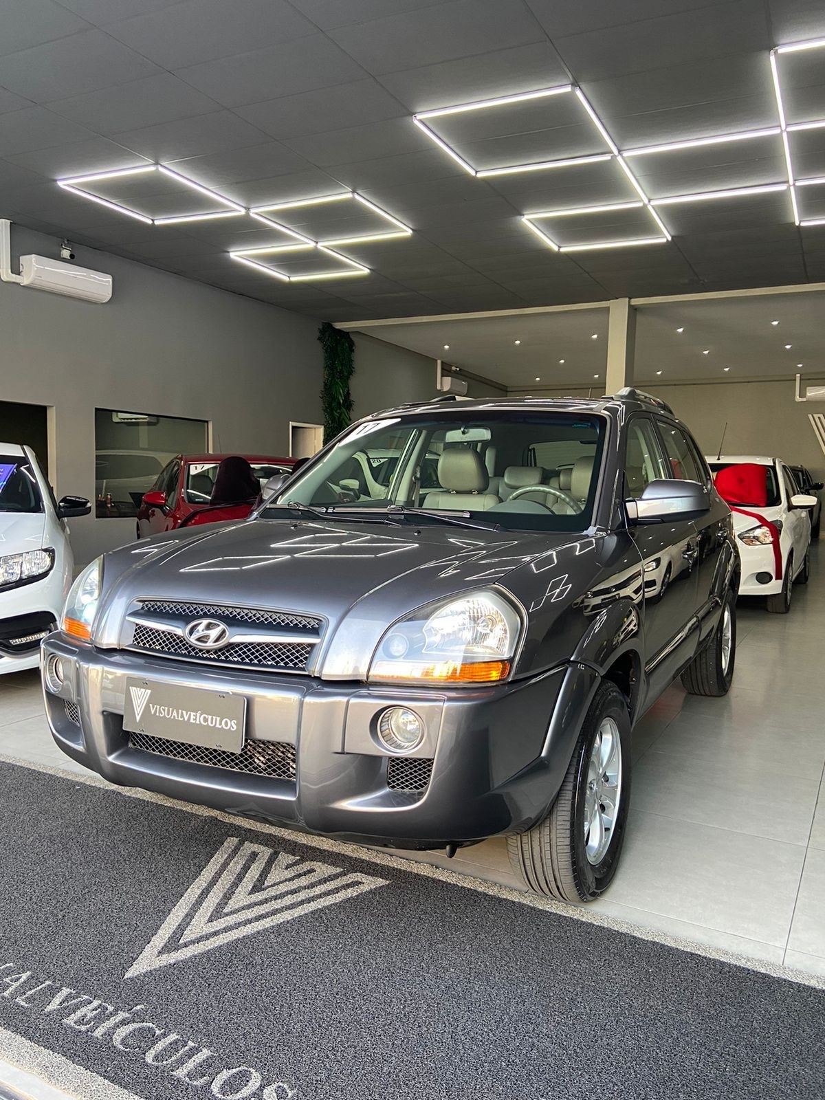//www.autoline.com.br/carro/hyundai/tucson-20-gls-16v-flex-4p-automatico/2017/valinhos-sp/24192616